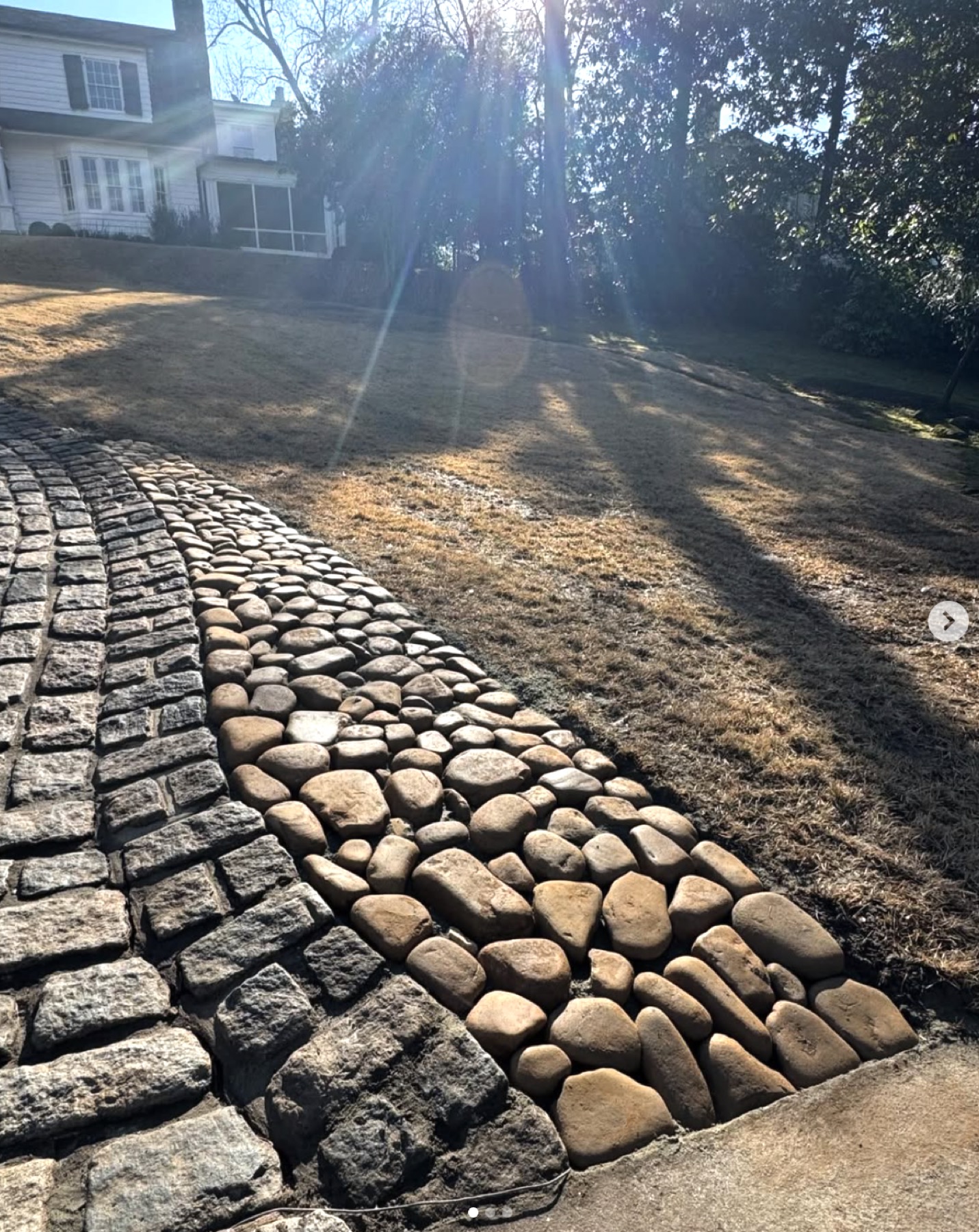 Fresh mulch beds with blooming purple phlox groundcover in Atlanta, GA